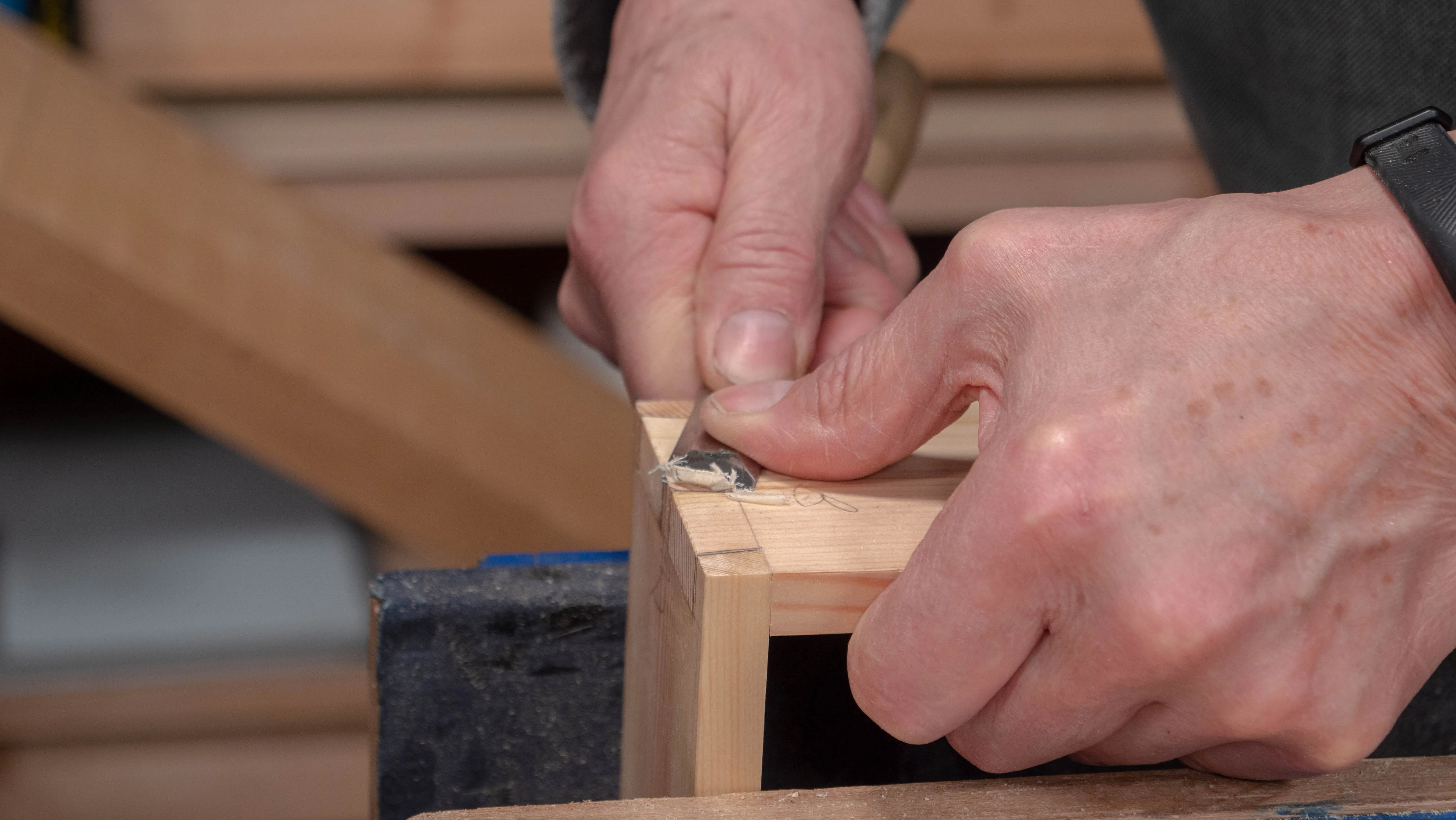 Use a slicing motion to pare the nubs with the corner of a sharp chisel