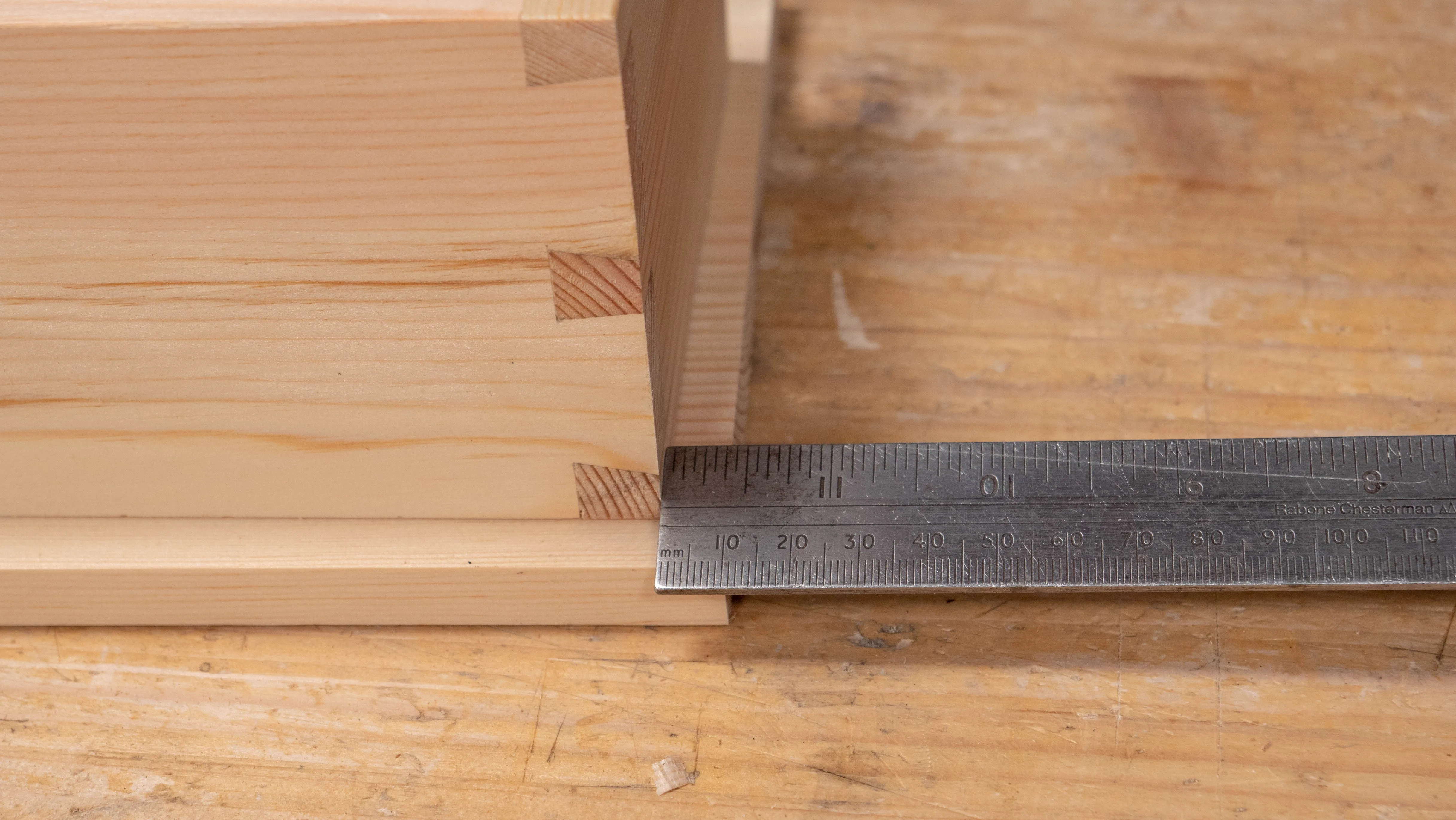 Add 3/8" (10mm) to both ends and make a knife nick on the end to cut off