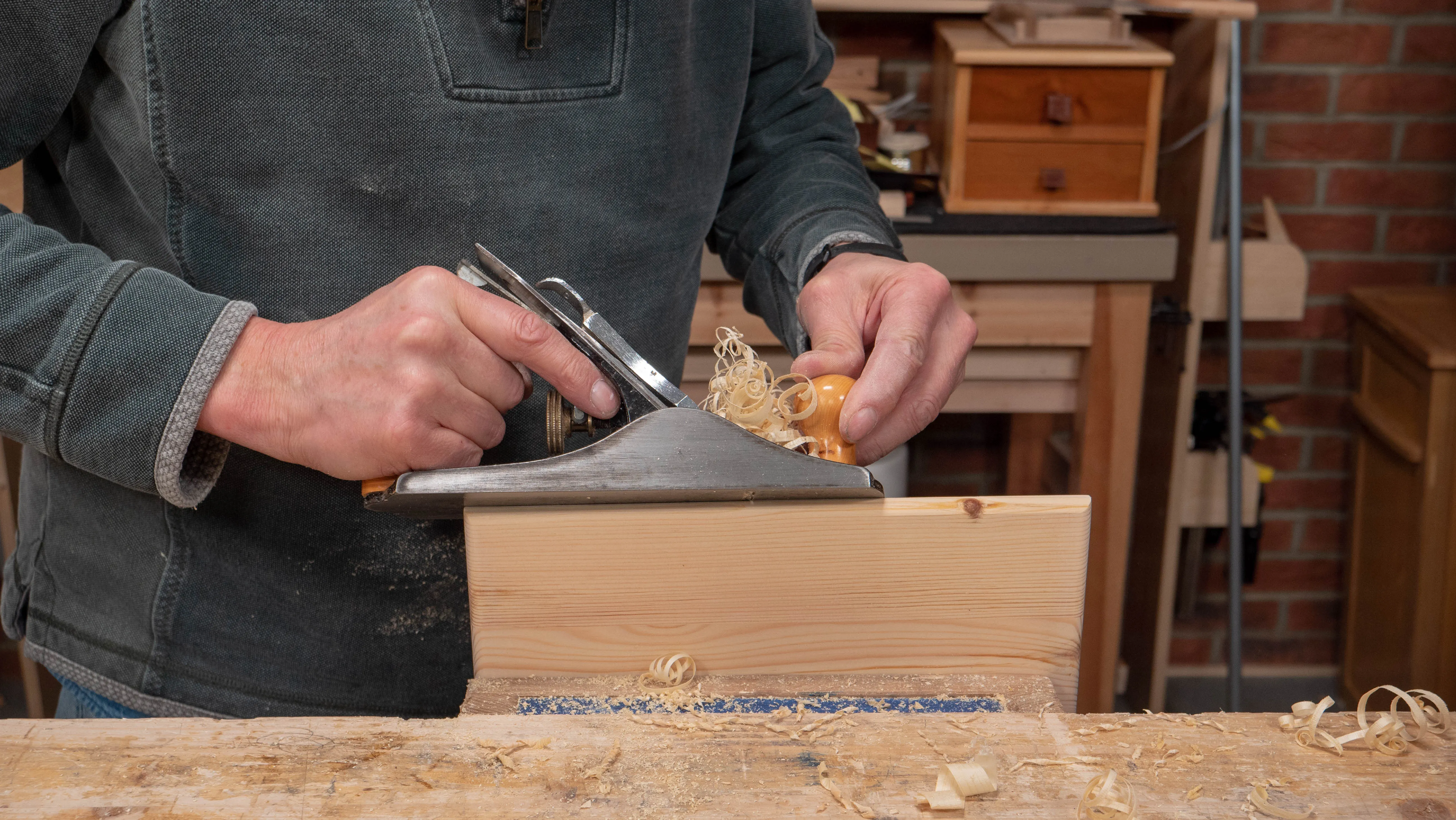 Refine the roundover with a fine set on your plane