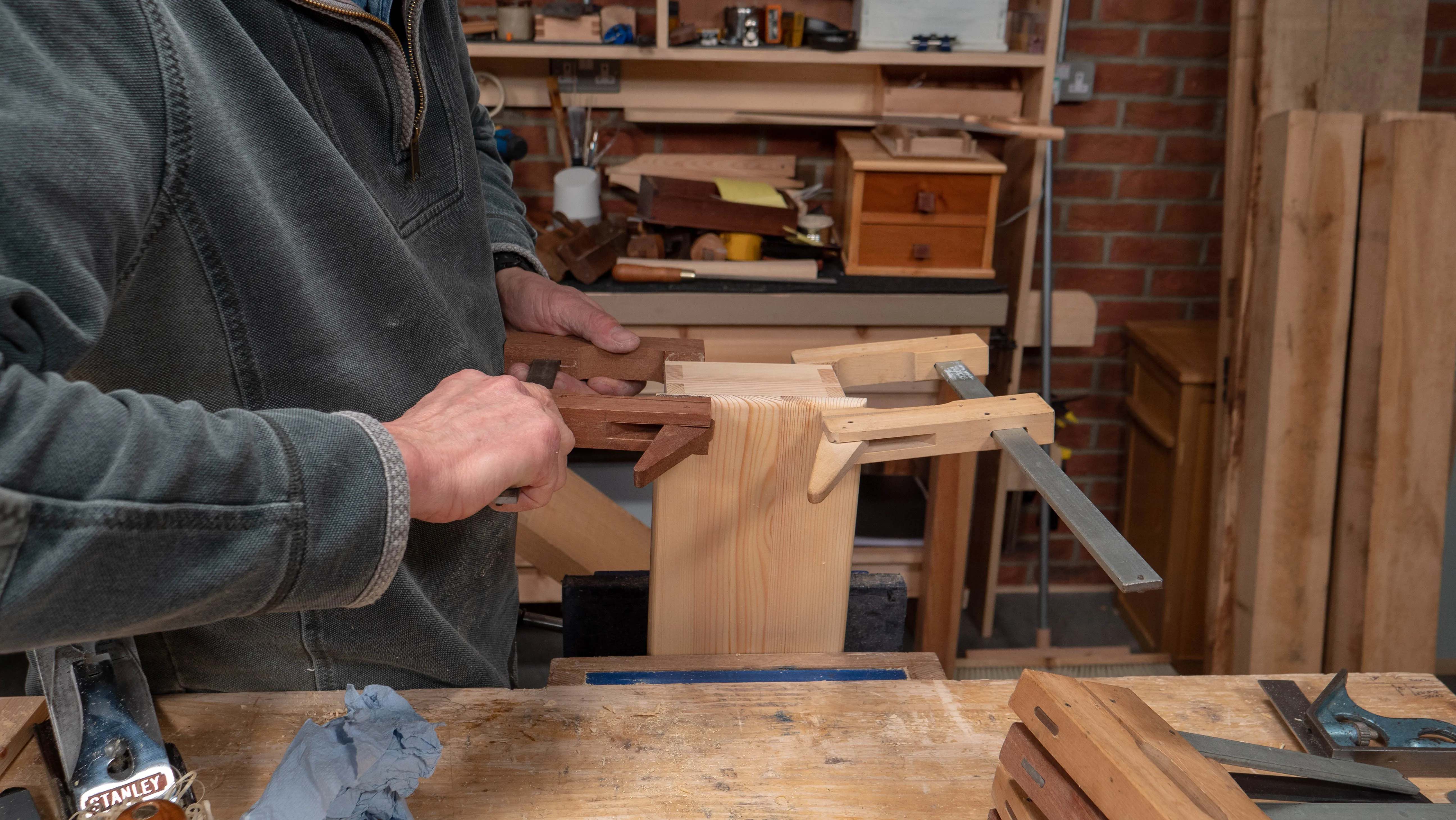 Apply some clamps to the opposite end of the box