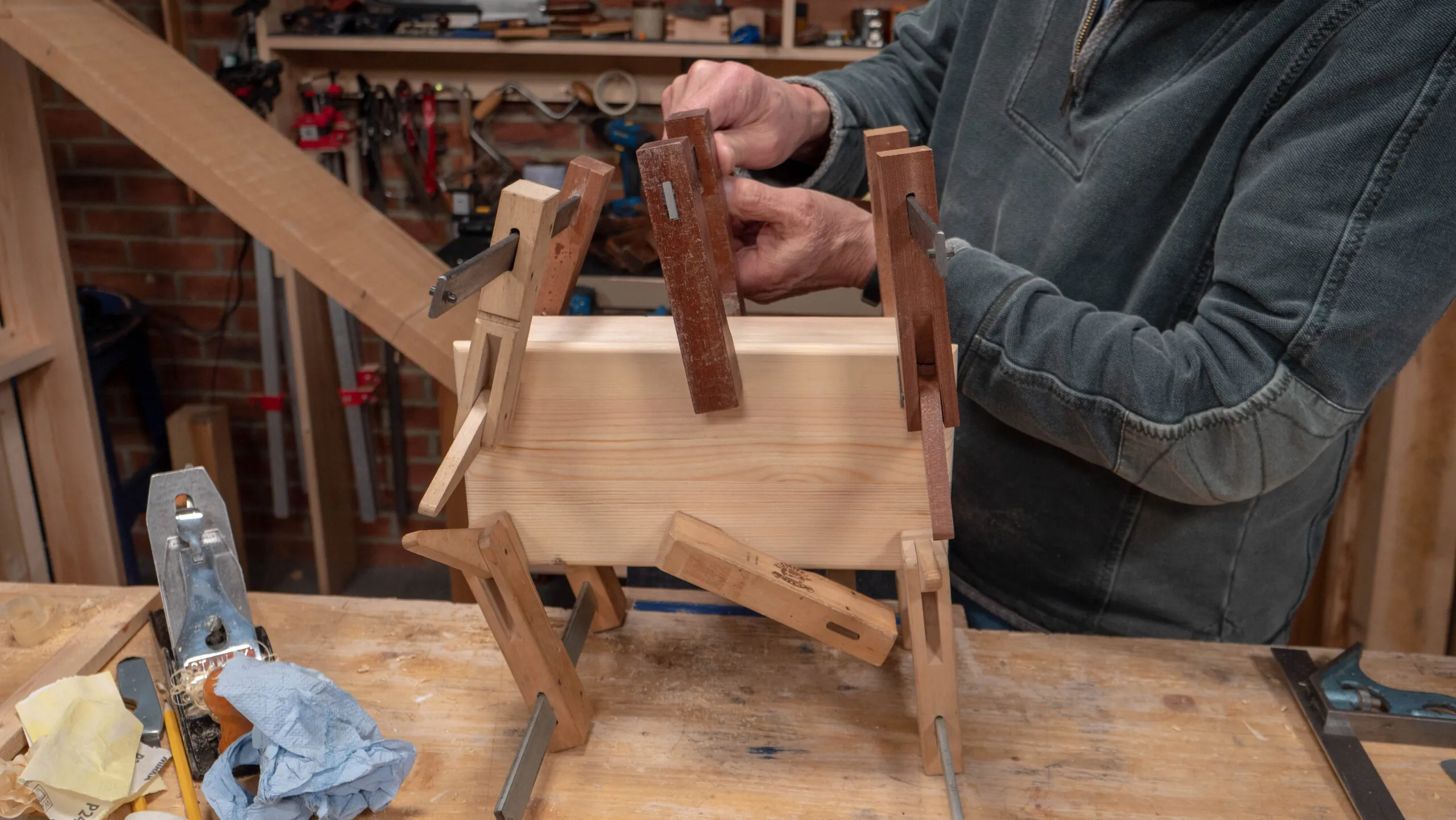 Apply more clamps but make sure you do not damage the top rims