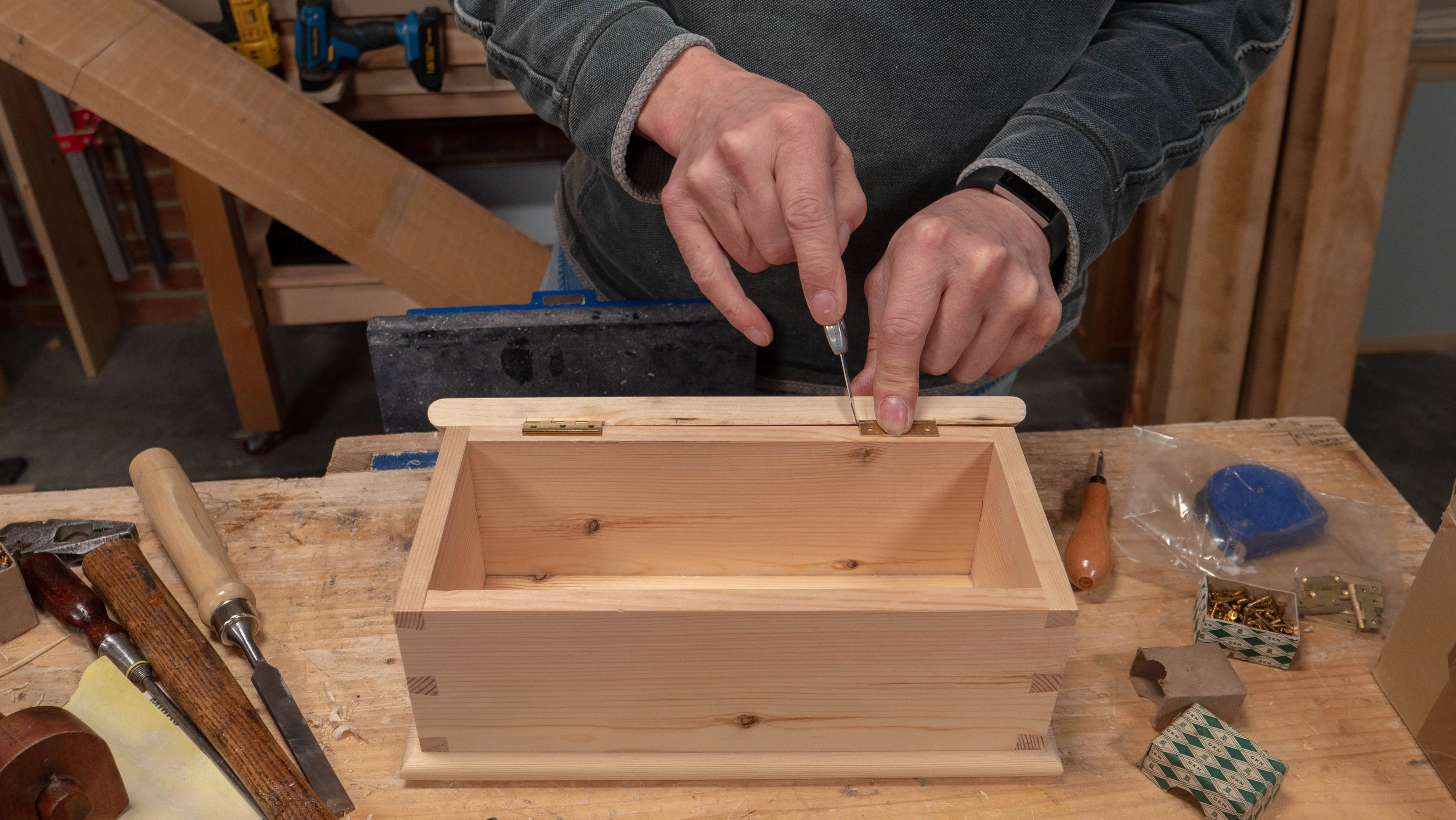 Ensure the hinges line up with the pencil marks