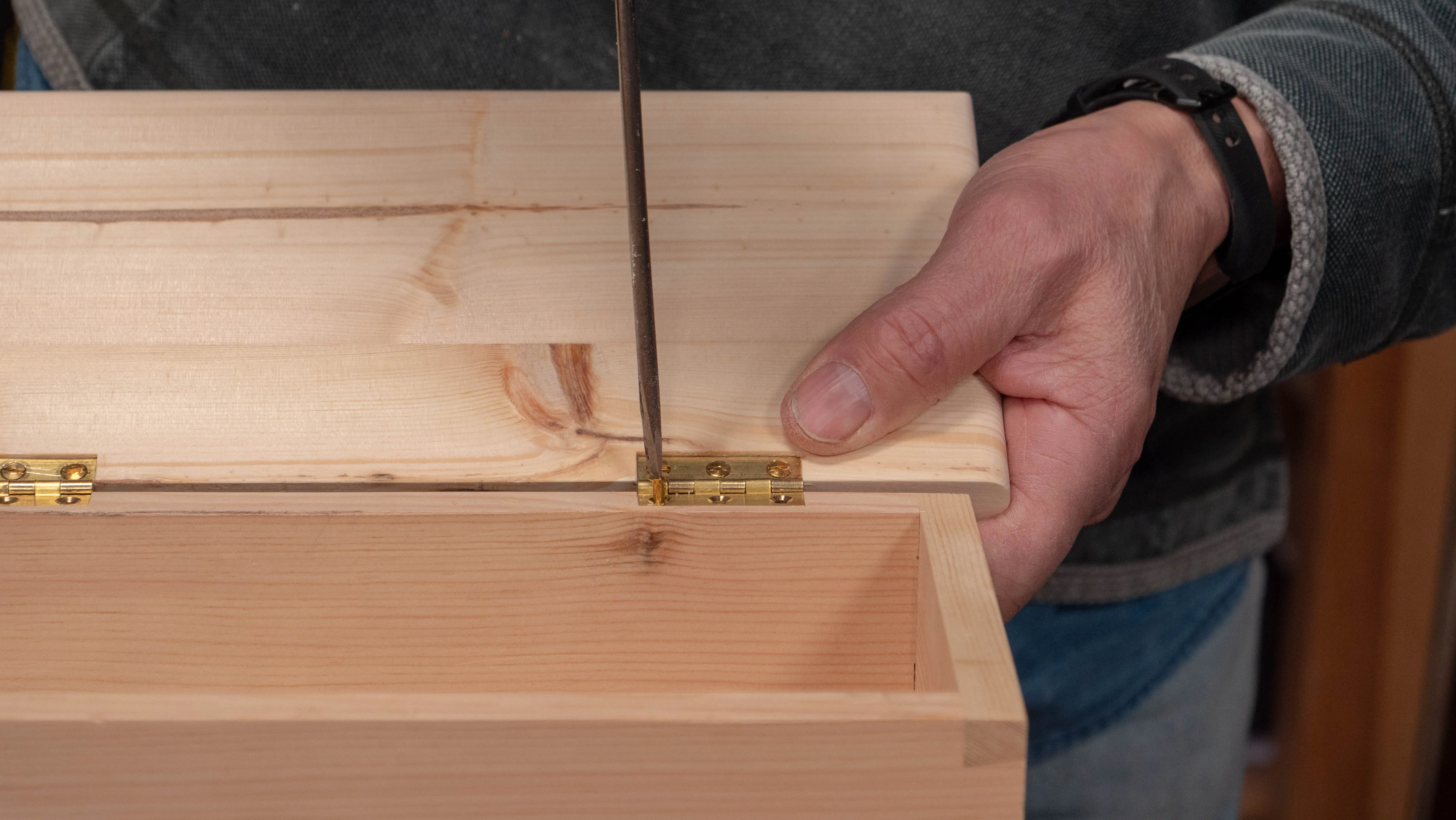 A bit of wax on the end of the screw helps to reduce friction