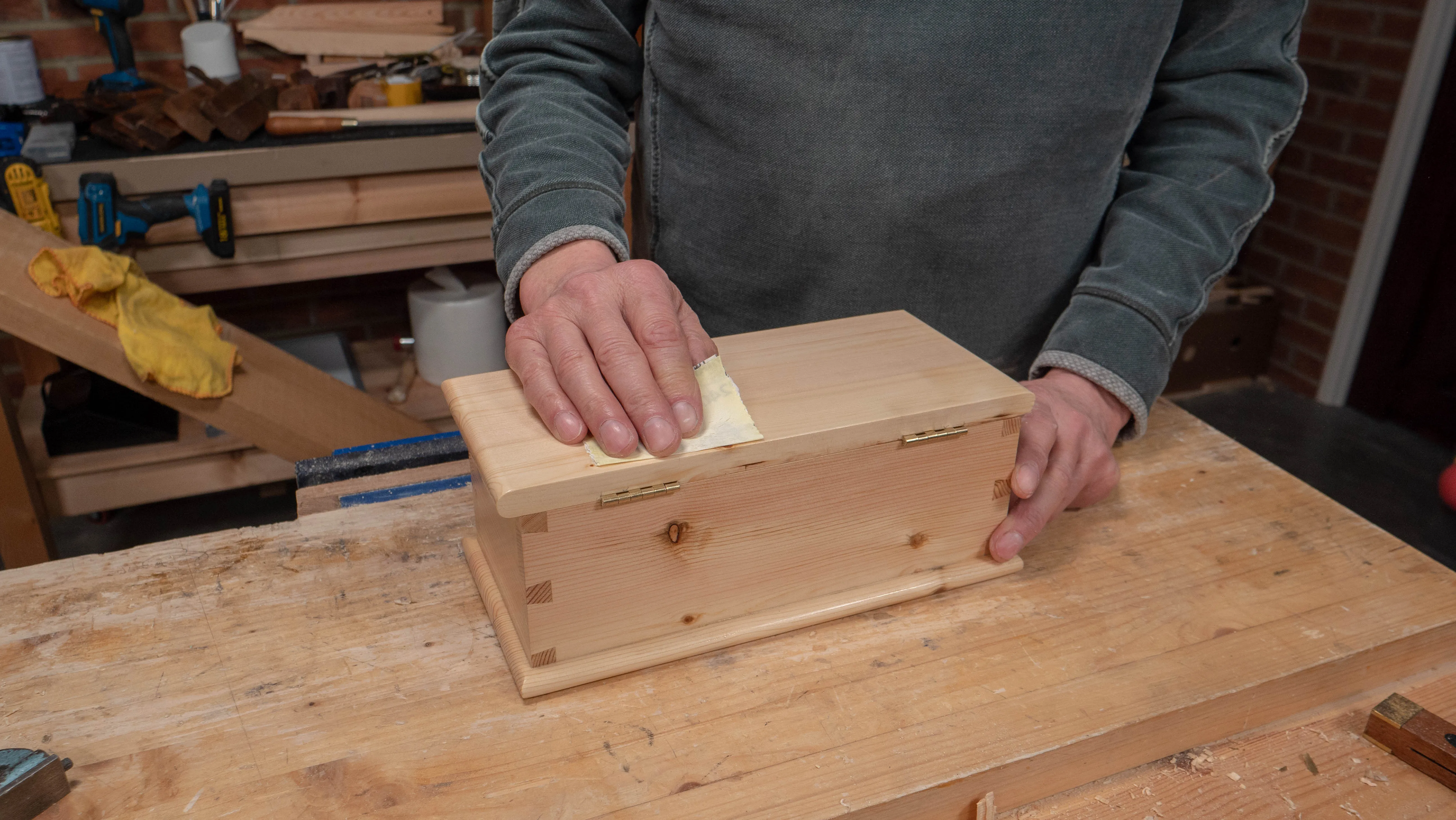 Give the first coat a light sand before applying subsequent coats