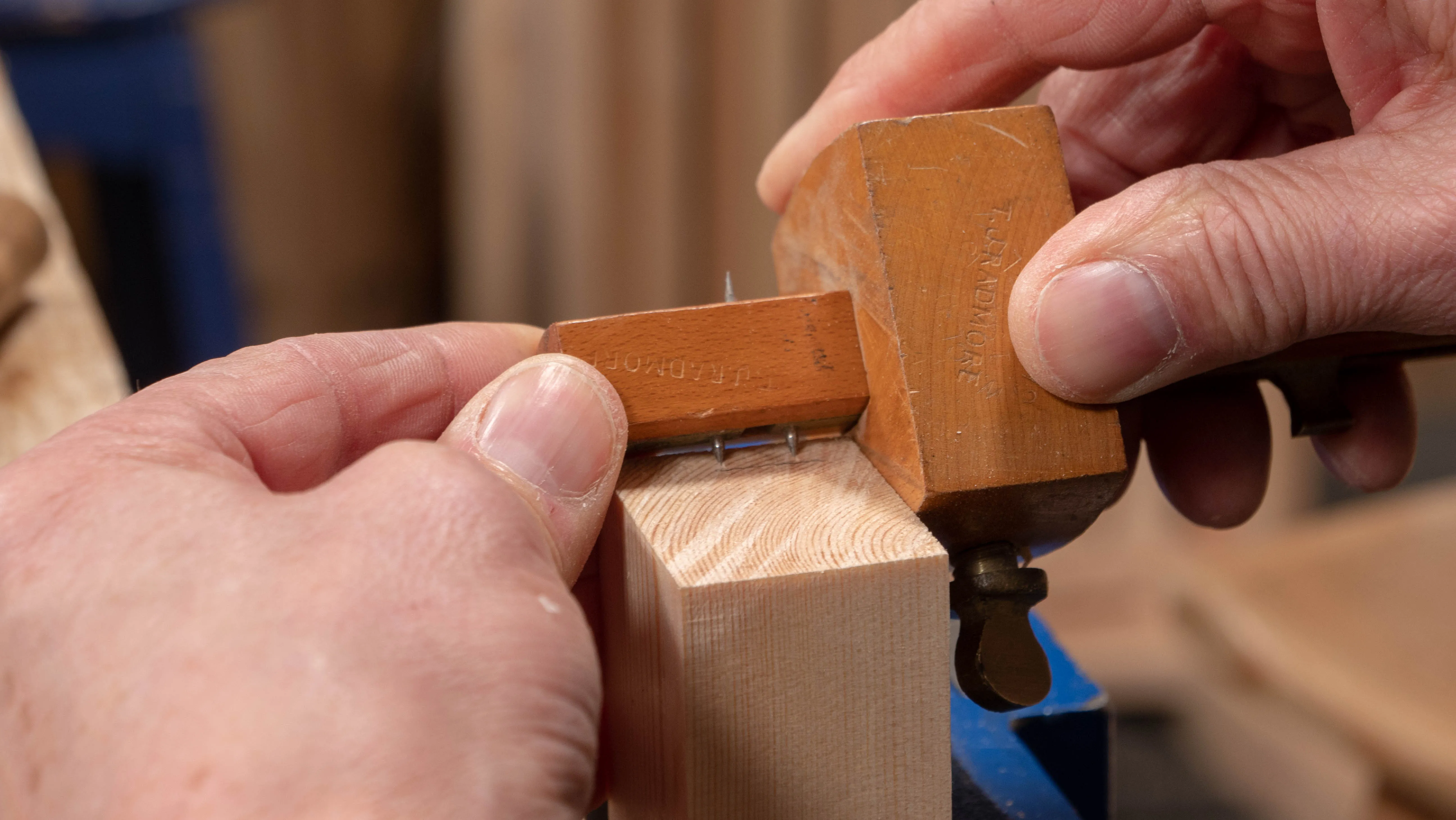 With your gauge still set as before, extend your gauge lines along the end grain, down to the new depth line.