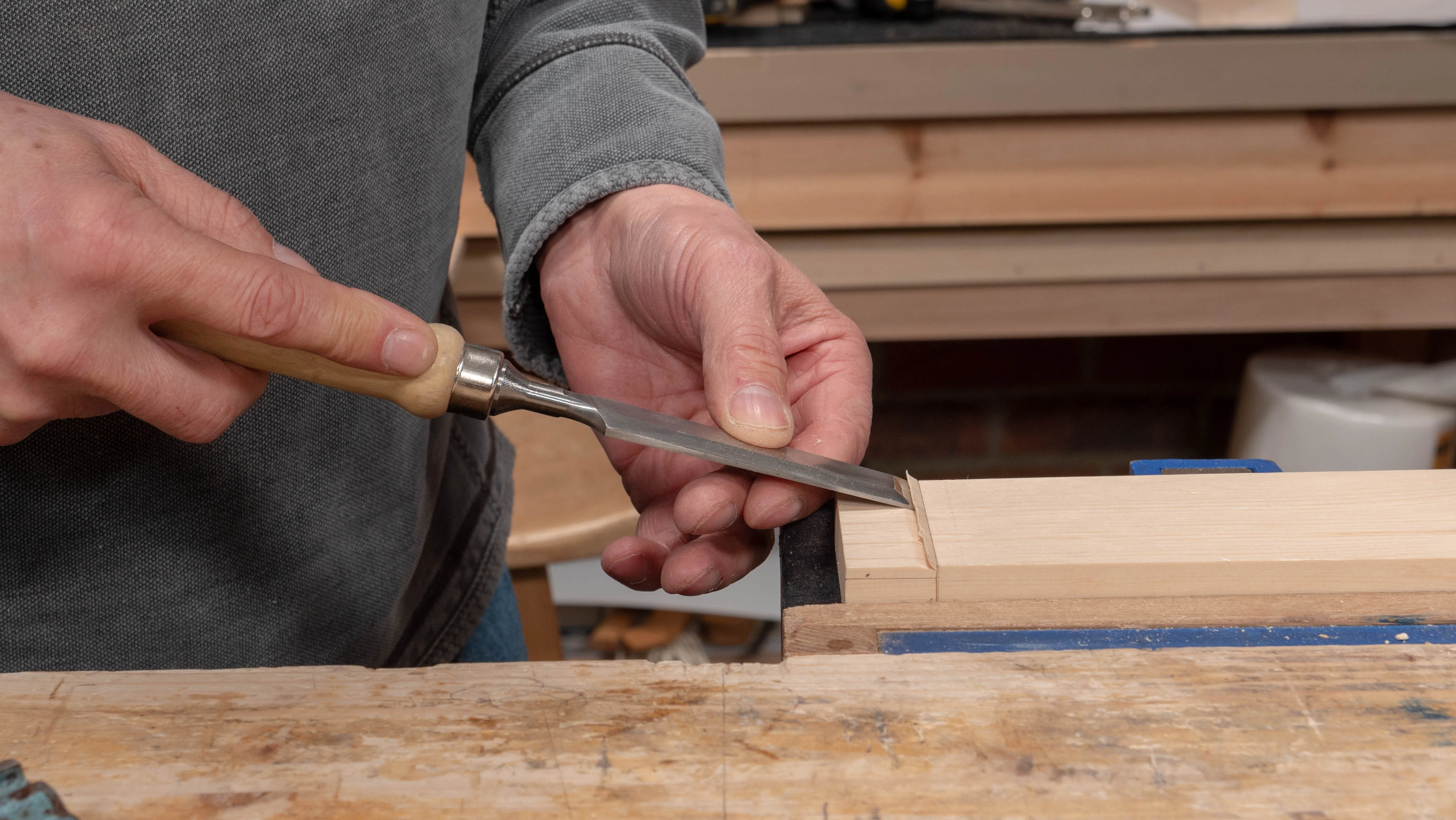 Pare into the knifewall with a wide chisel before sawing the shoudlers
