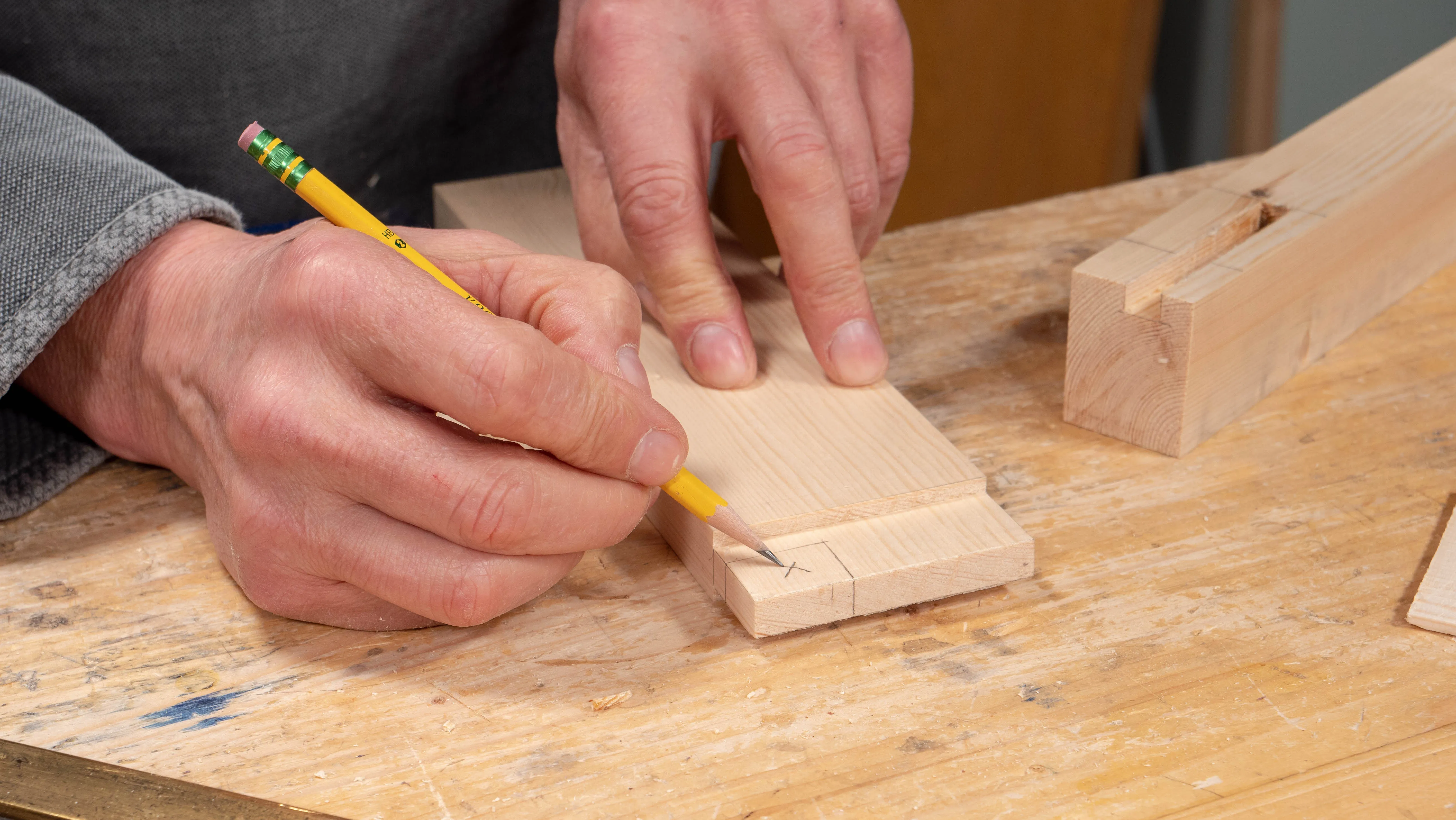 Mark the waste with an X to help you remember which side of the line to cut on