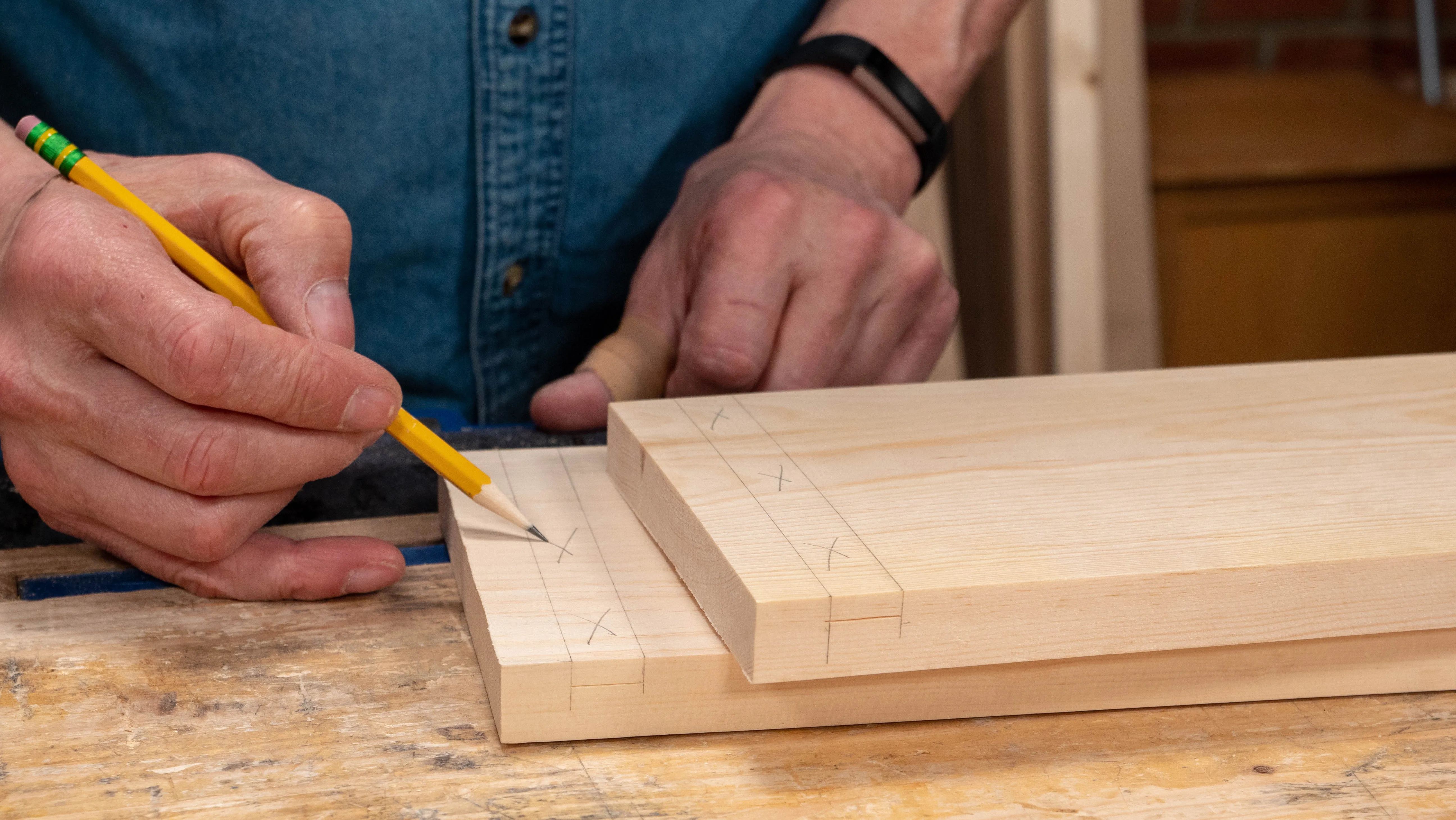 Mark the wood to remove with an X