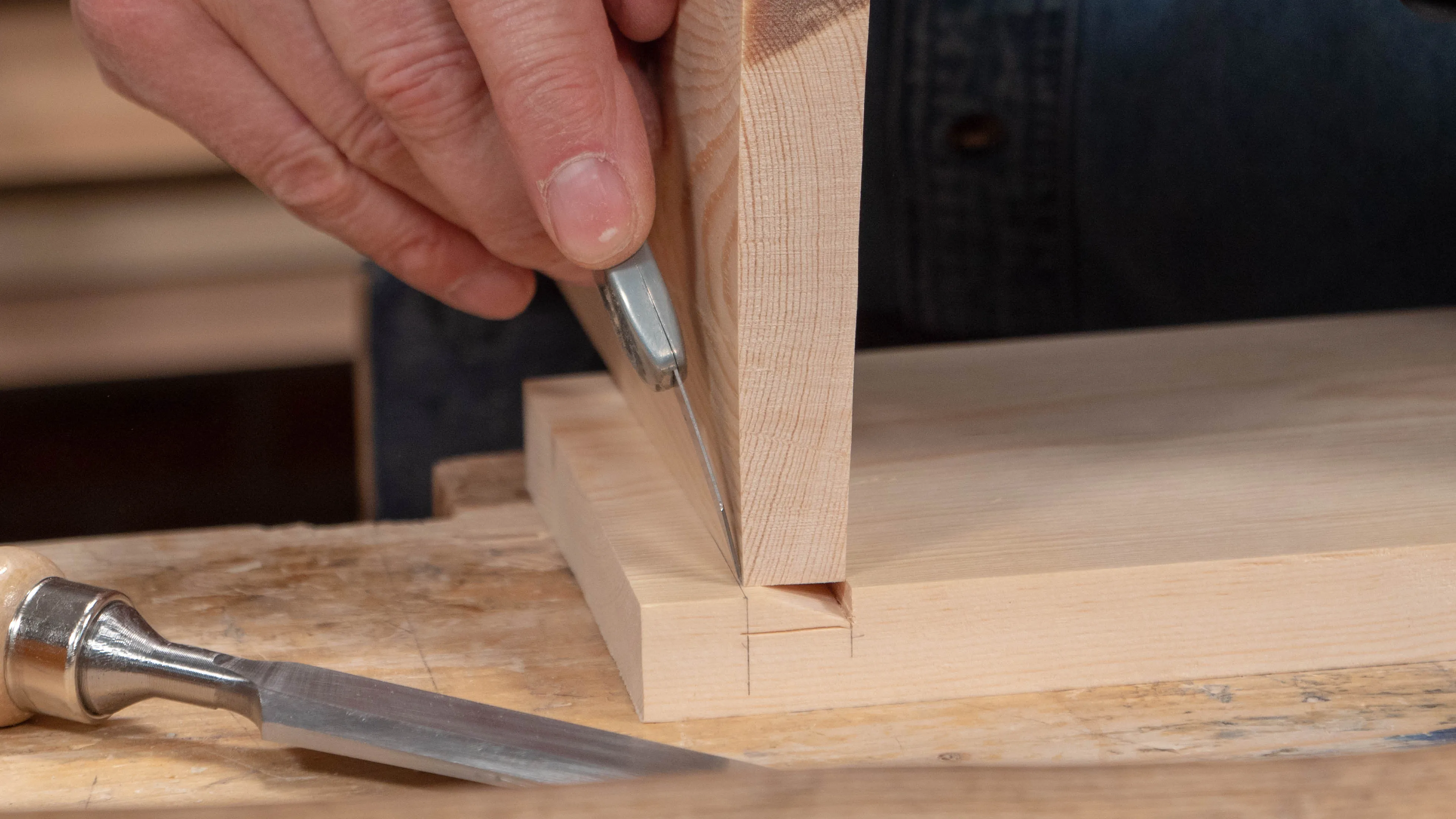 Make a small nick with the point of your knife to give you an exact reference for your knifewall