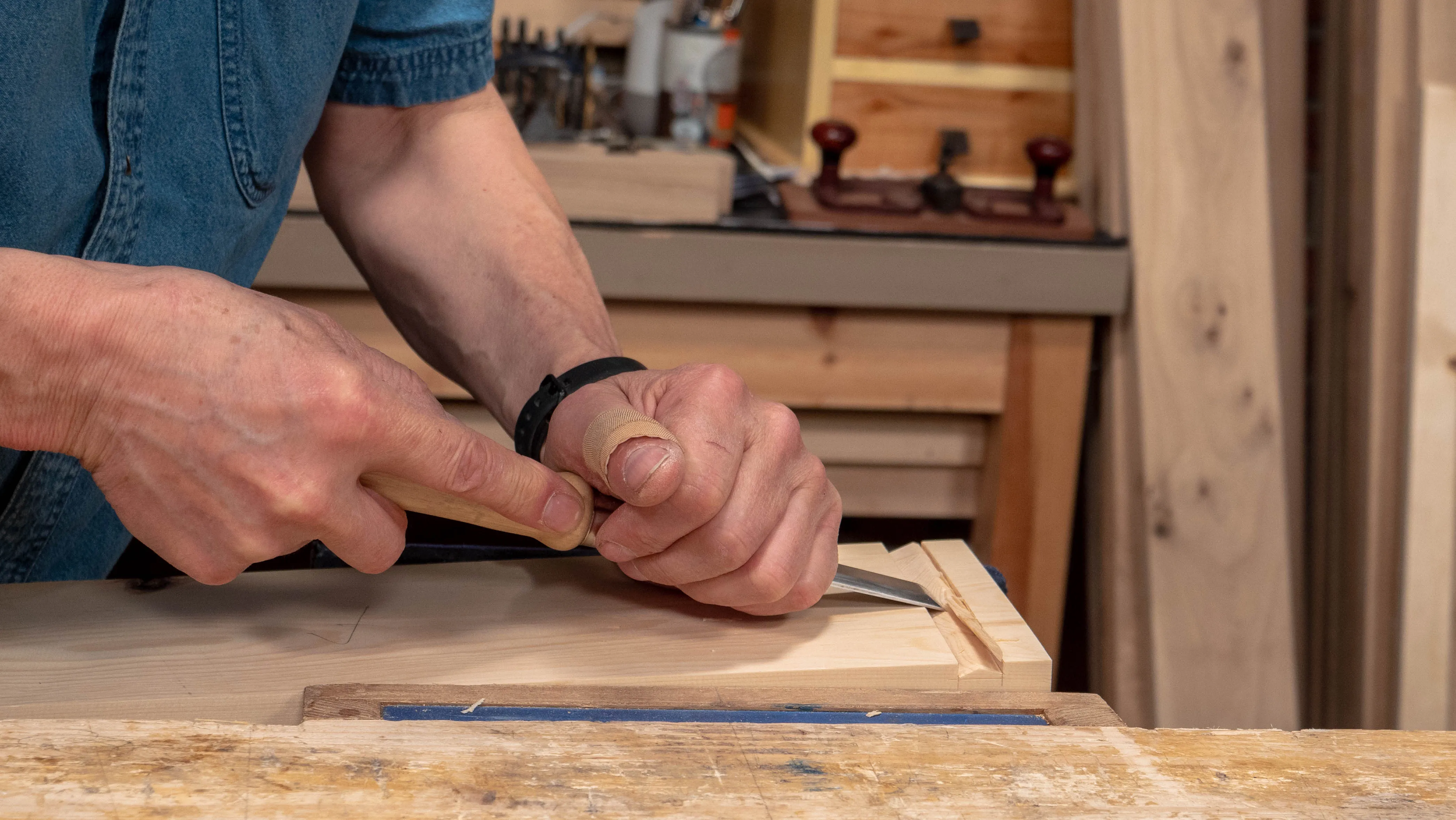 Pare into the cut with a firm grip on your chisel