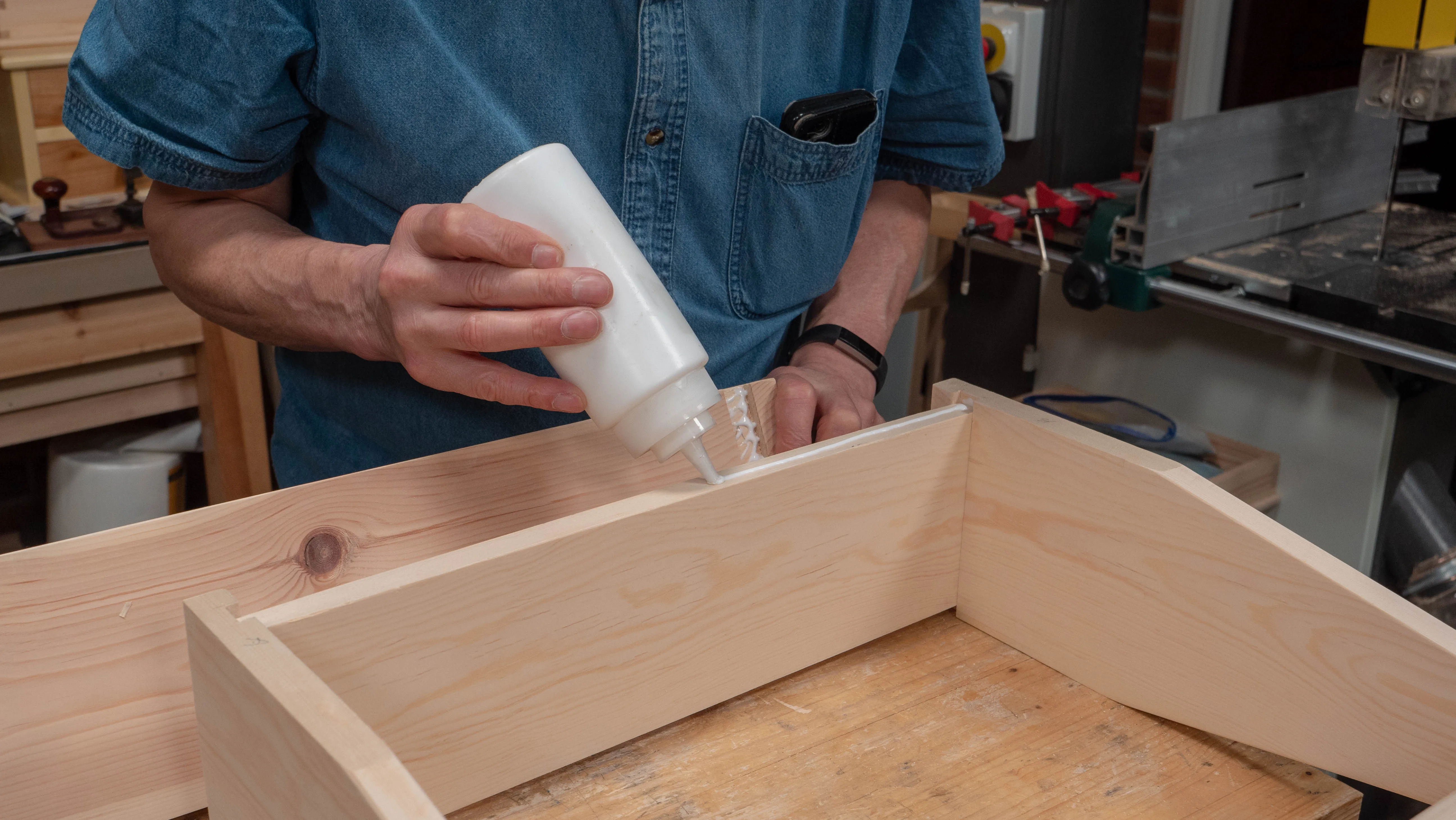 Apply a thin bead of glue on the edge of the base before assembling