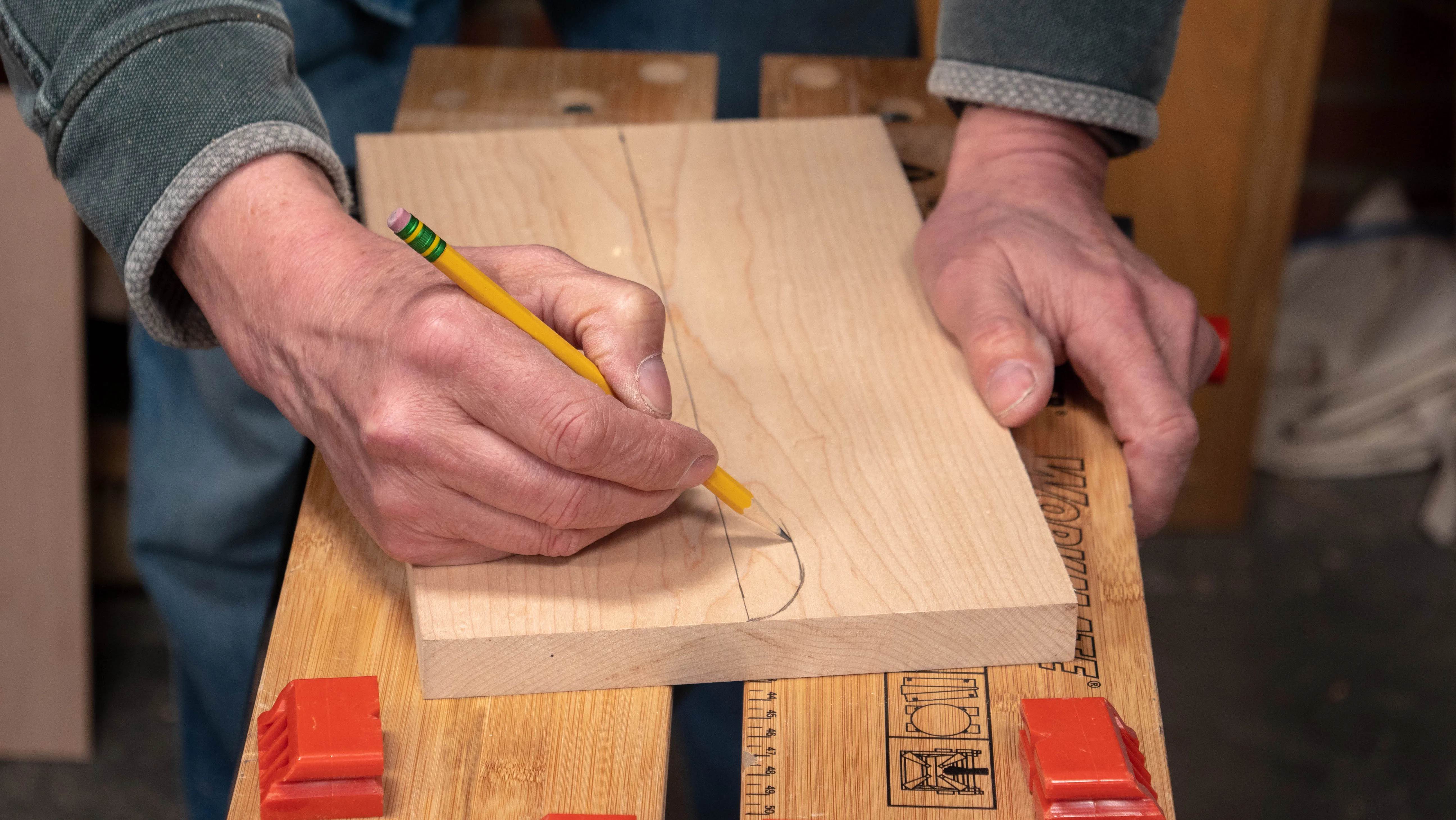 Draw the shape of a handle to one side of the centre line only