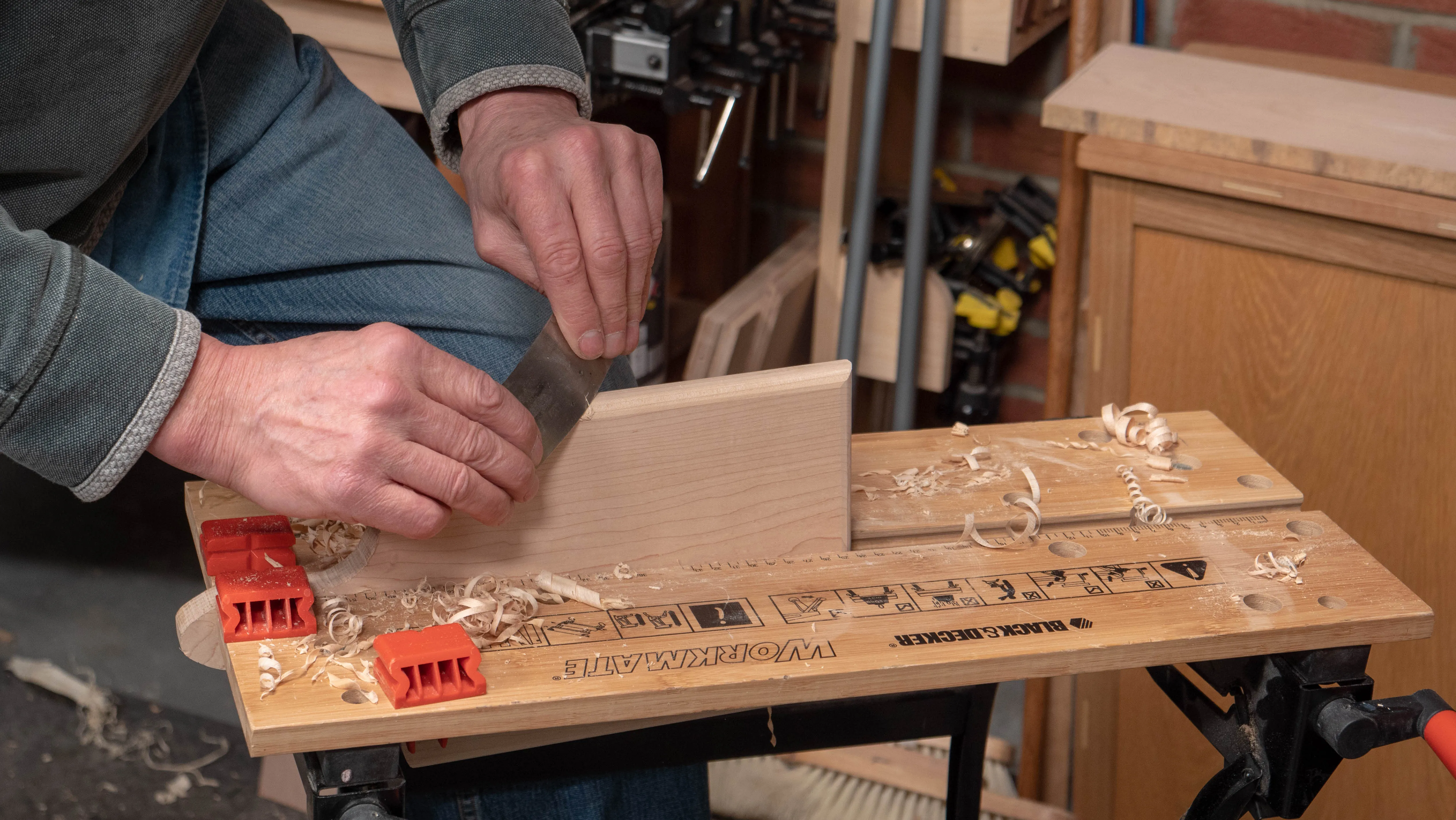 Refine the contour with a sharp card scraper, bending it slightly to avoid creating more flats