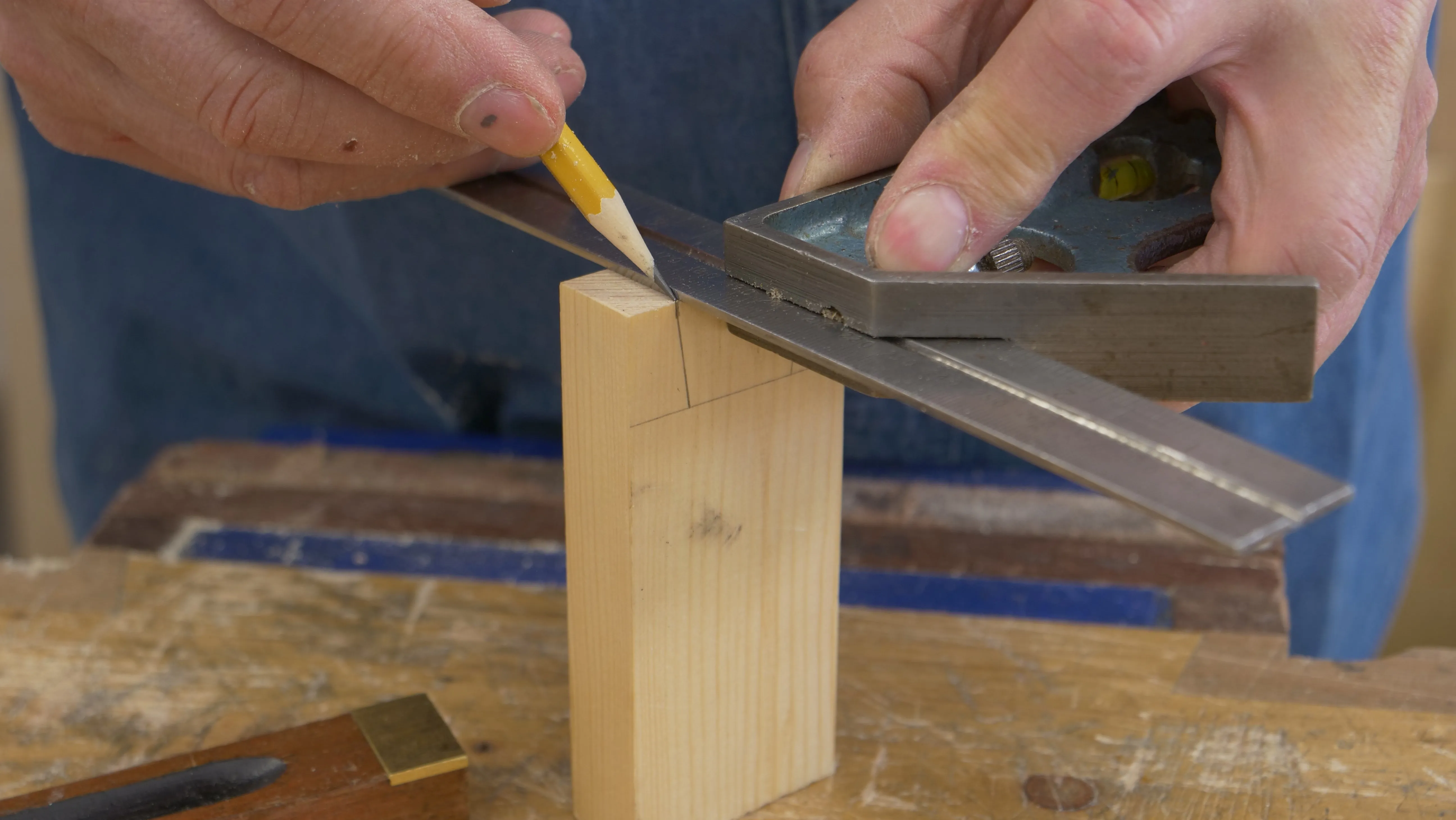 Square the ends of the tails, making sure your square is registered correctly