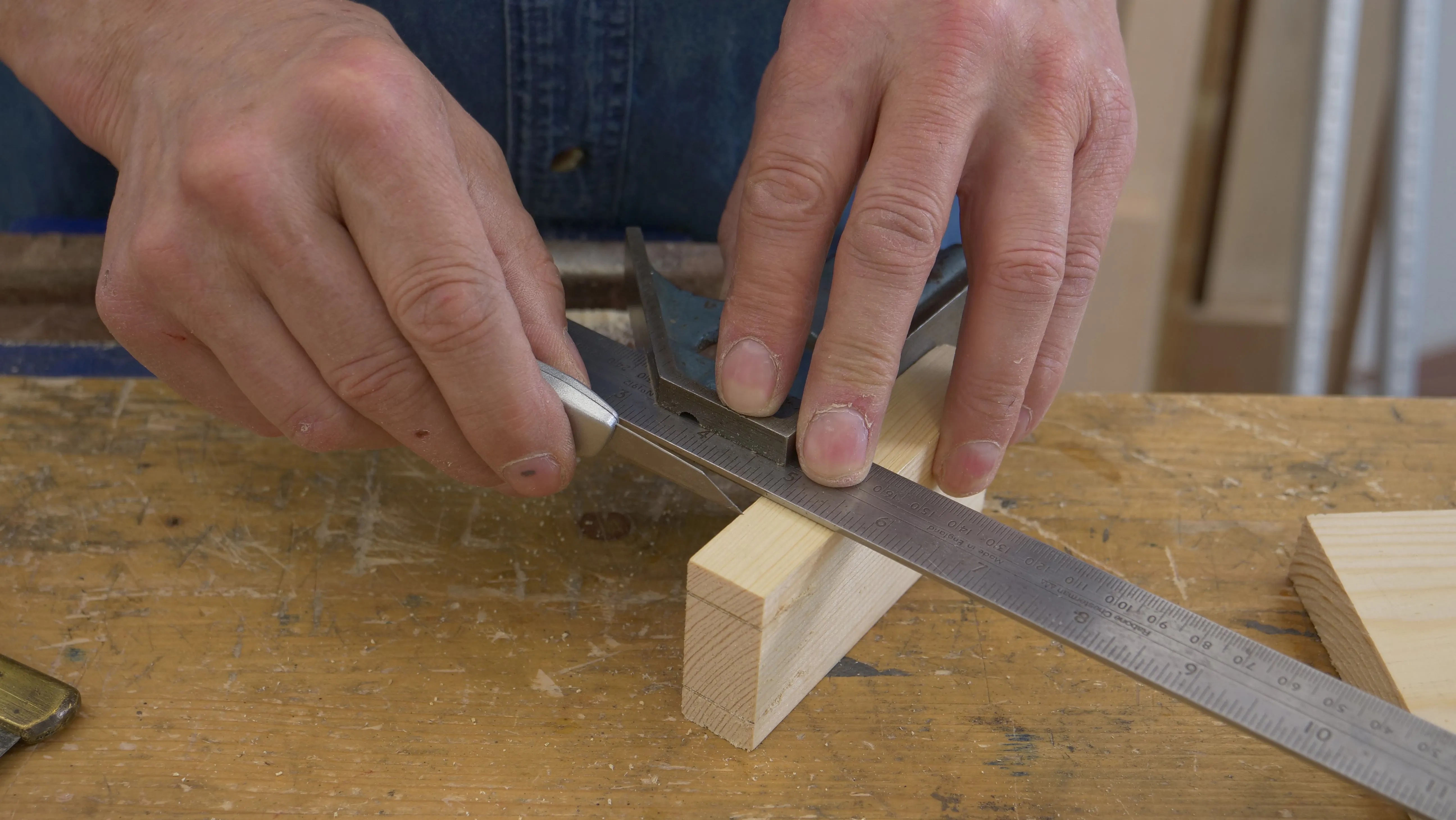 Turn your piece on edge and carefully square the knifewall onto the back