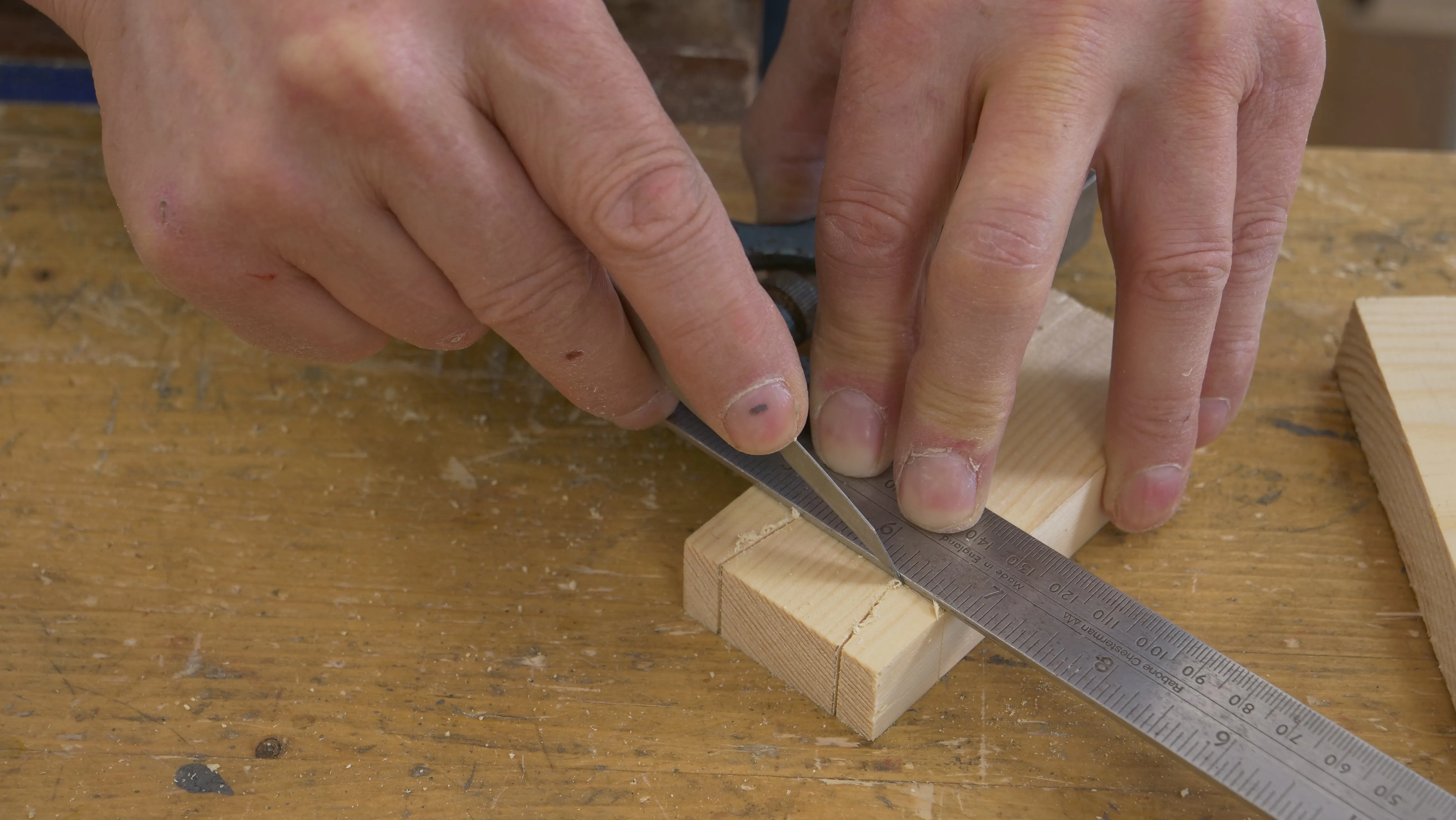 Flip your square and extend the knifewall onto either side of the tail on the back, and also on the final edge