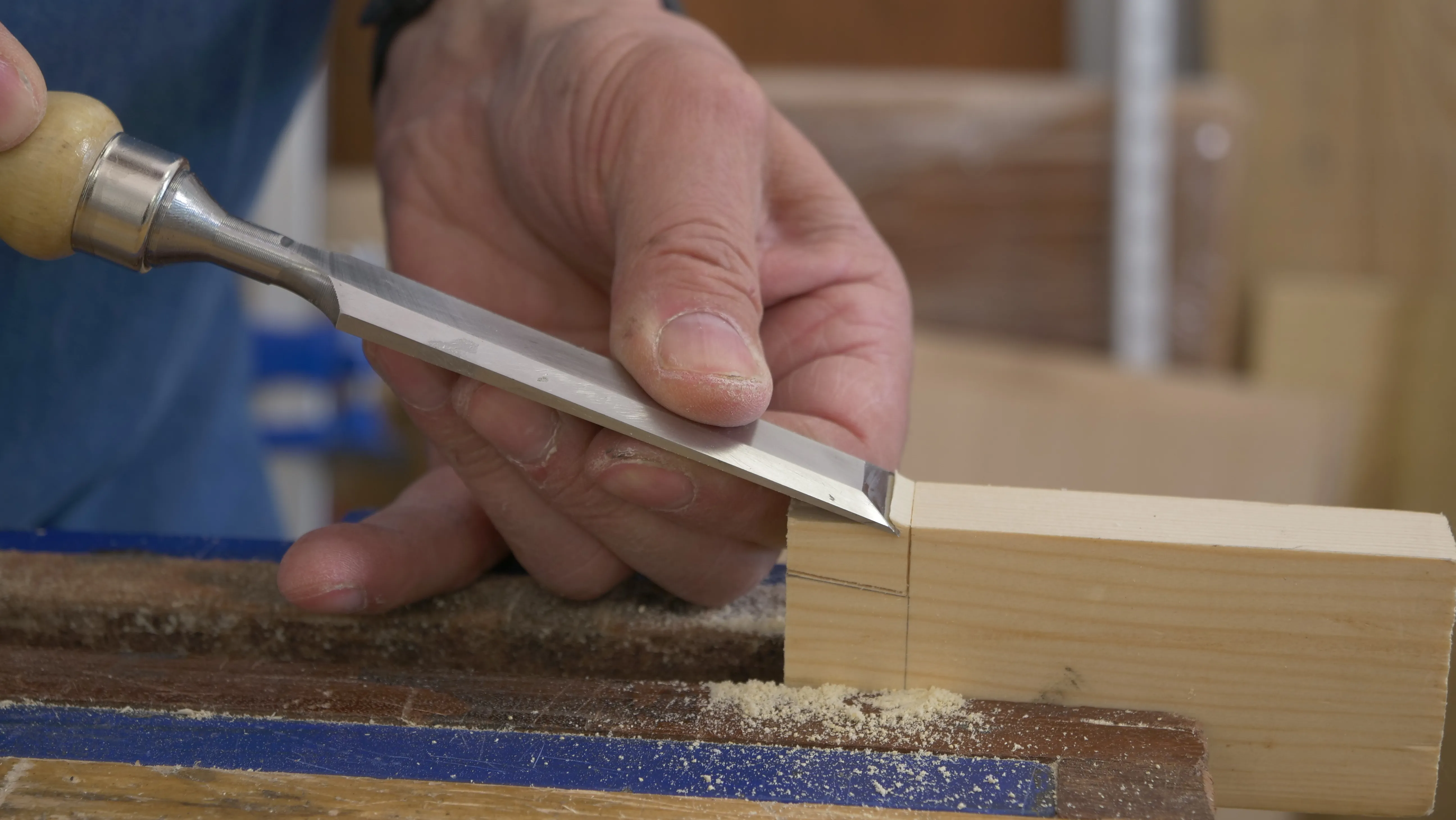 Create a step down on the waste side of the knifewall to help start your saw cut