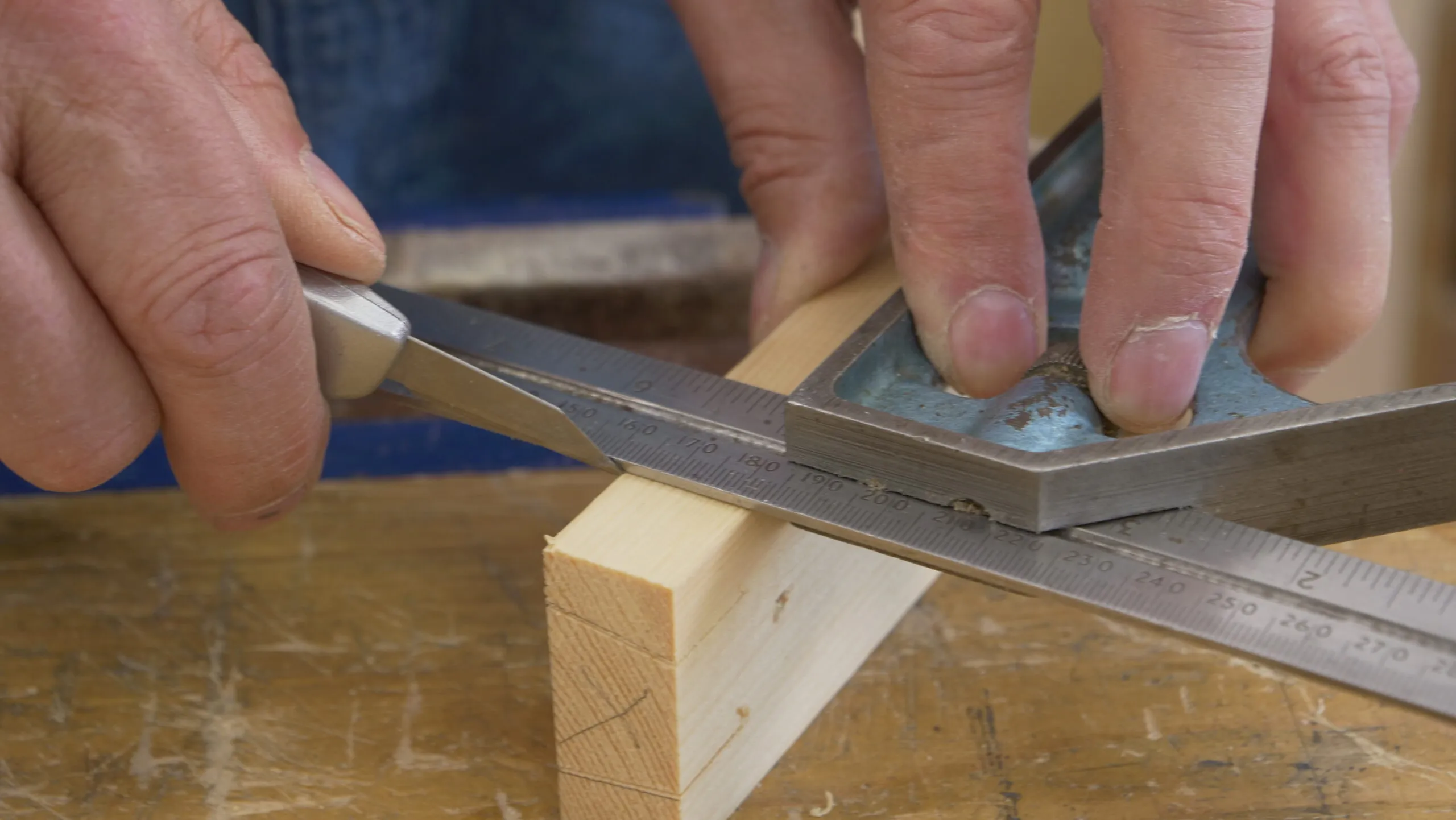 Use that knife nick to align the square and make a second knife nick in the following corner