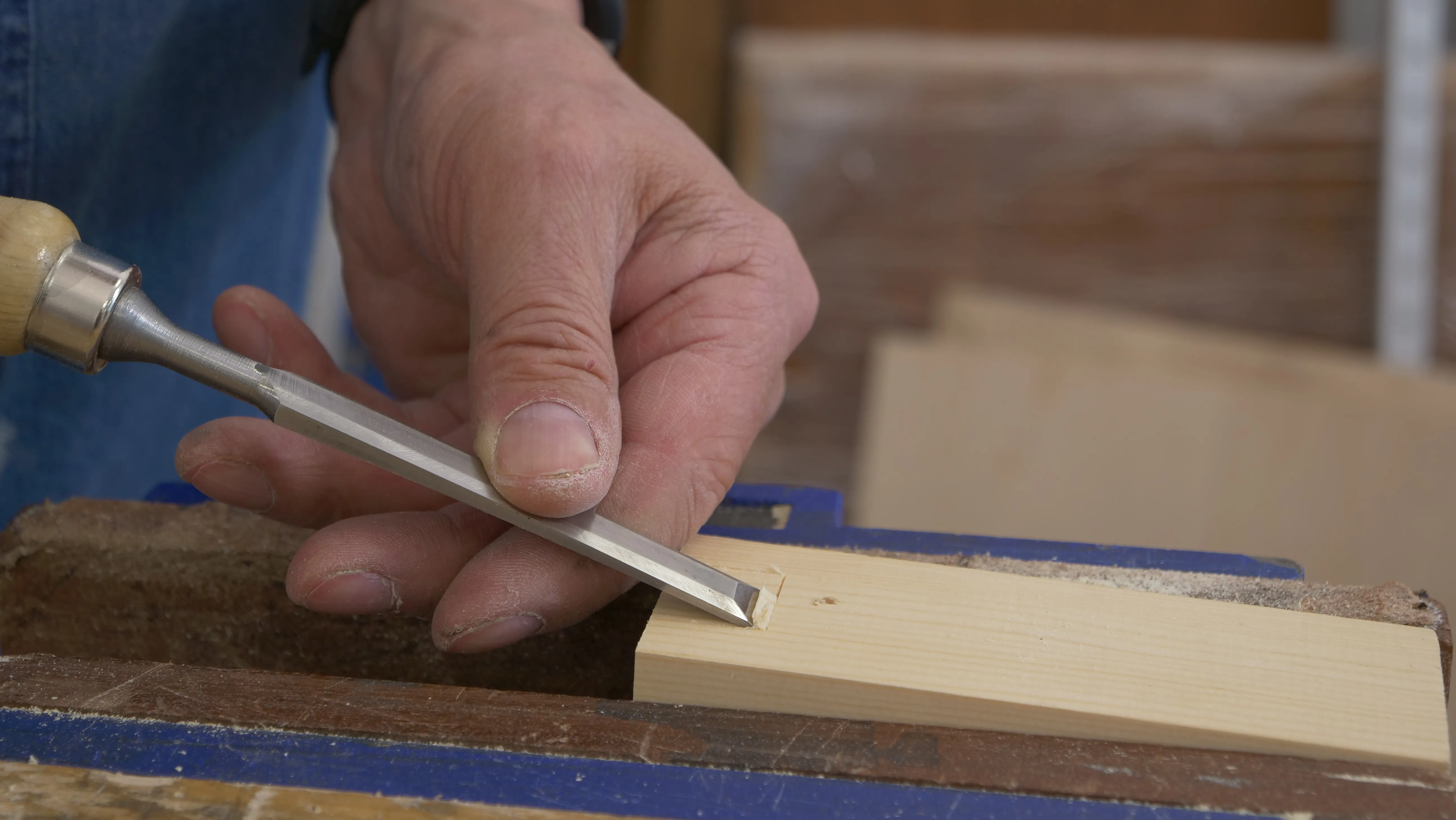 Create a relief on the waste side of the knifewall with a sharp chisel