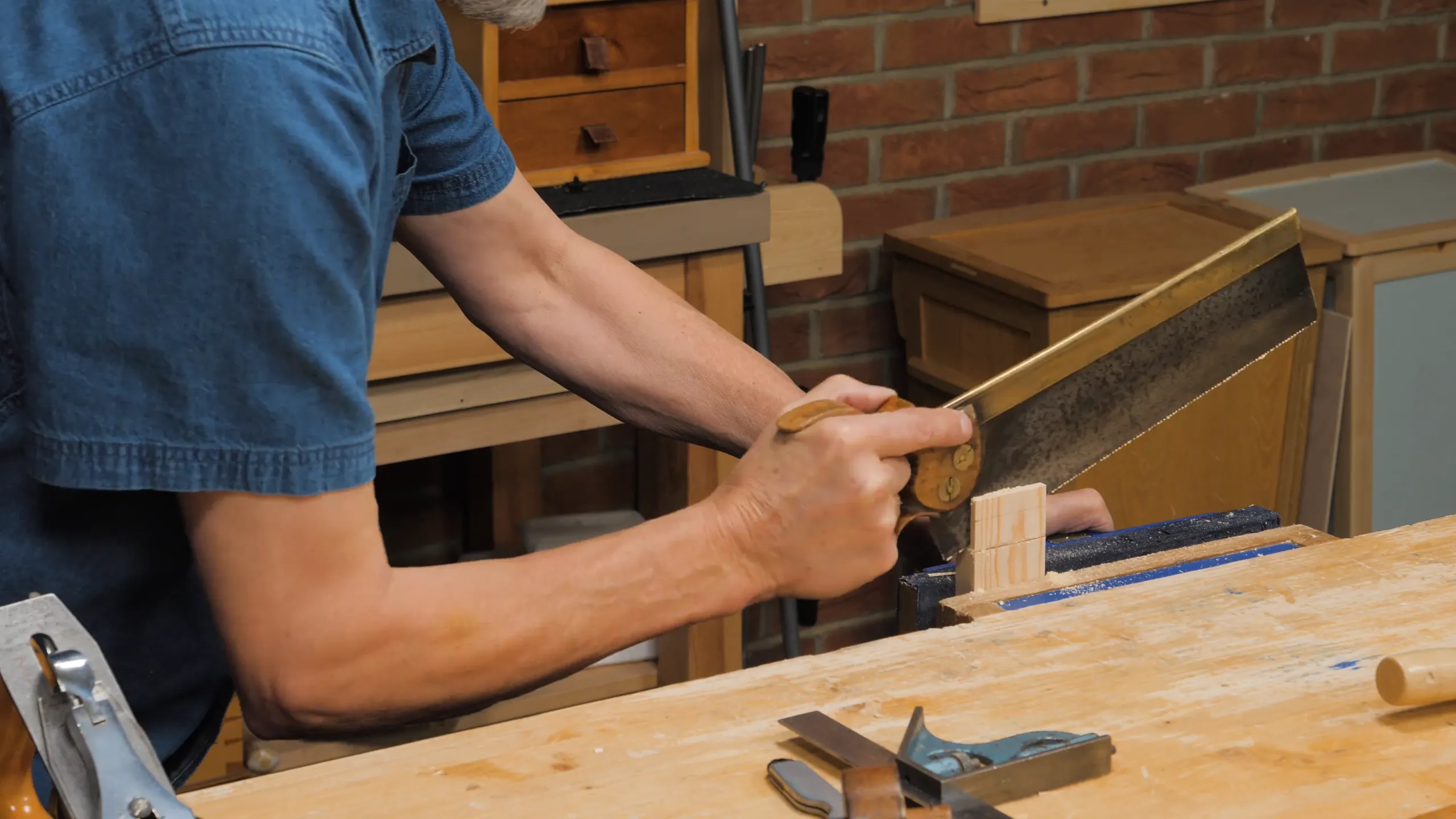 For longer tenons, drop your hand to cut diagonally and work from both sides