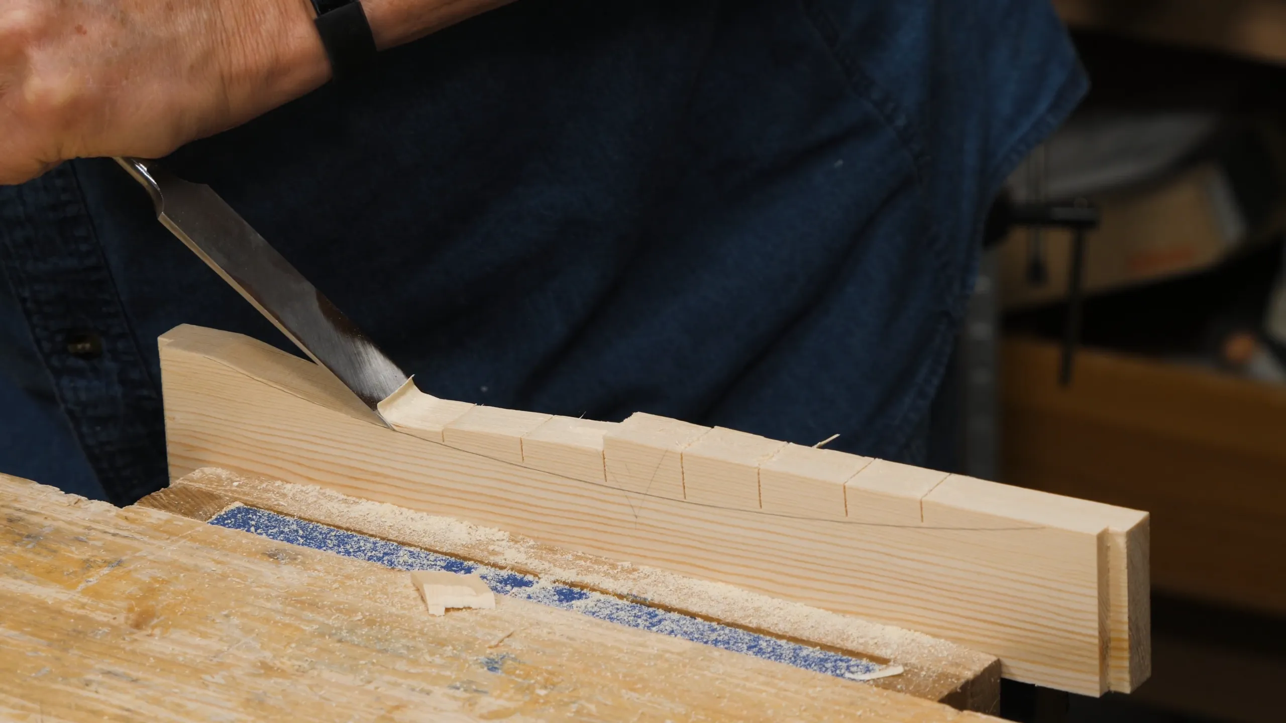 Split off the waste high above the line first in case the grain direction dives below your pencil line