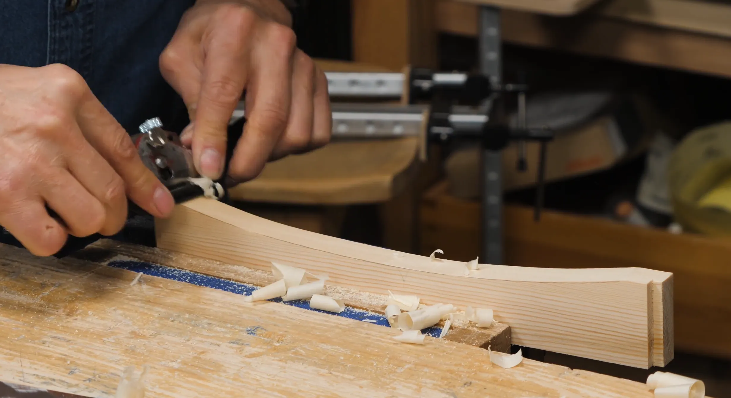 Work from both sides with a sharp spokeshave to get a clean surface