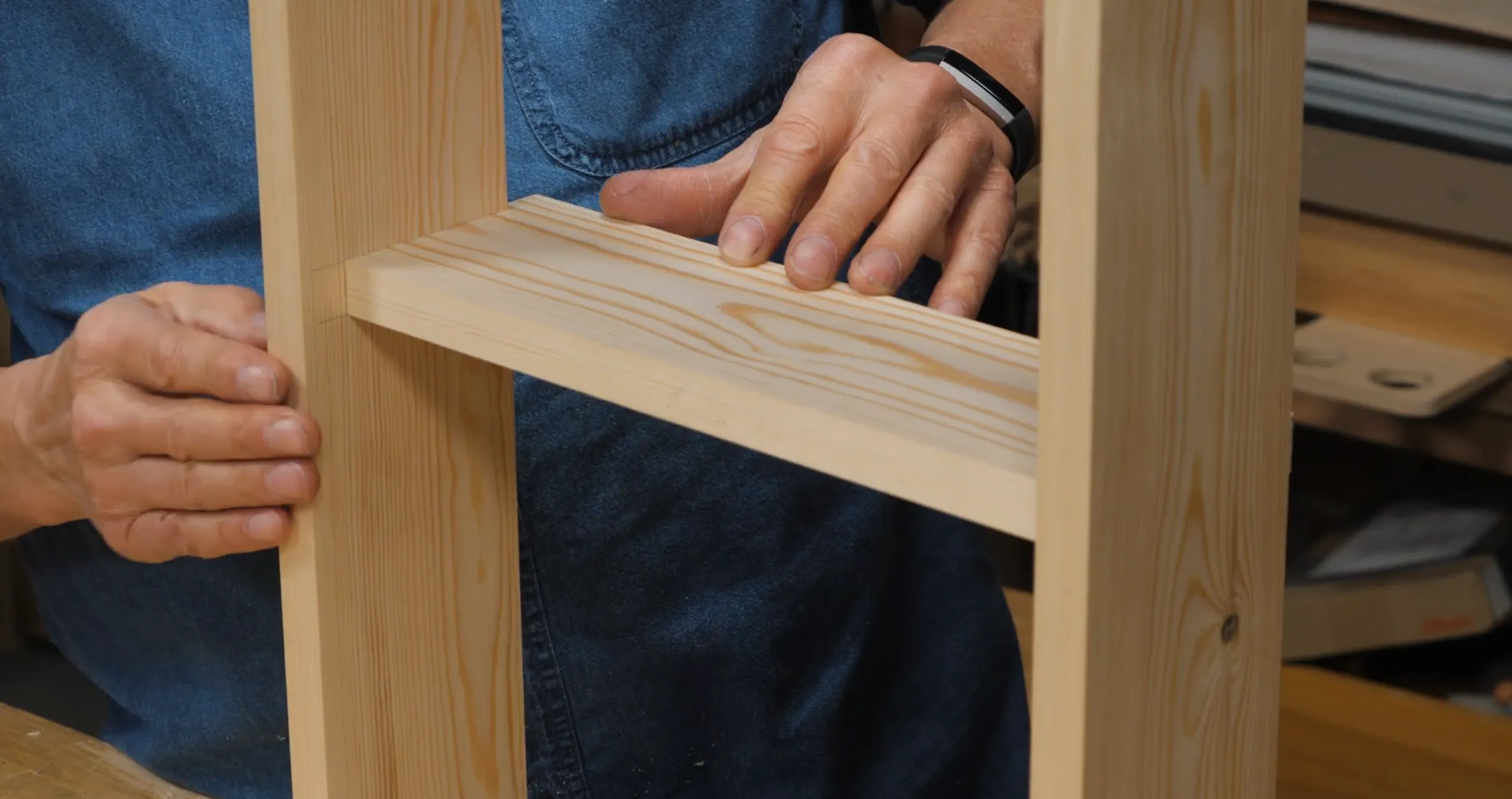 The recesses are cut to depth, but the shelf needs two notches to allow it to come to the front