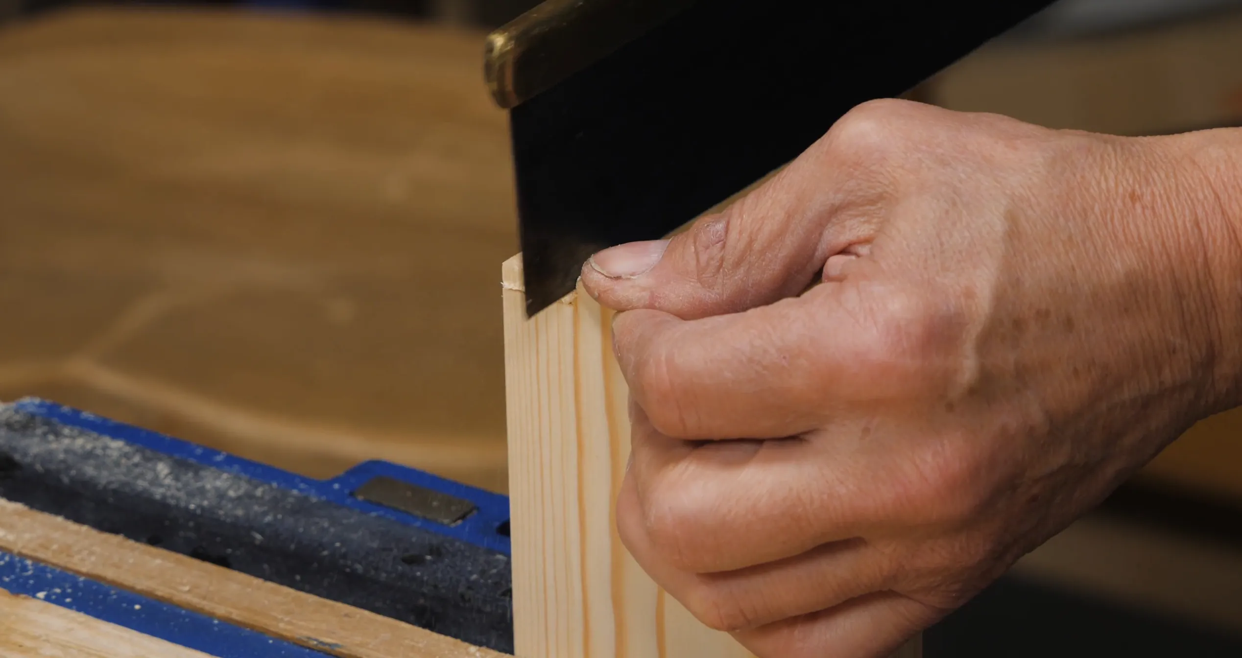 Saw down the (short) length of the notch carefully...